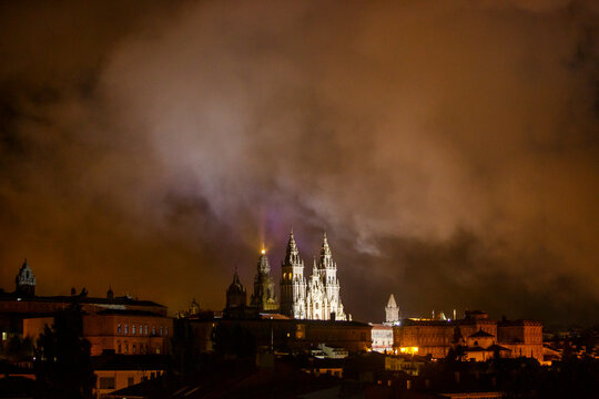 View of facede of Cathedral of Santiago with strong night fog