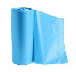 Fototapeta na wymiar Roll of turquoise garbage bags on white background. Cleaning supplies