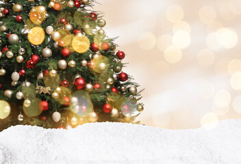 Beautifully decorated Christmas tree and snow on light background, space for text. Bokeh effect