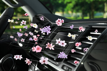 Floral scent from ventilation in car. Air freshener