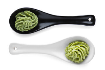 Serving spoons with spicy wasabi paste on white background, top view - obrazy, fototapety, plakaty