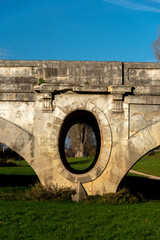old stone bridge and river