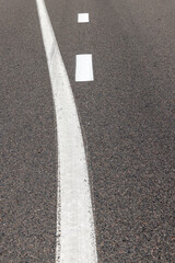 paved road for car traffic