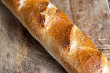 a whole wheat baguette, not cut into pieces
