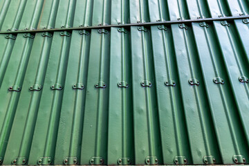 Part of the metal structure of an old steam locomotive