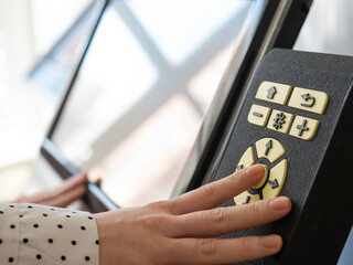 A woman uses a voting device for blind and visually impaired citizens. 