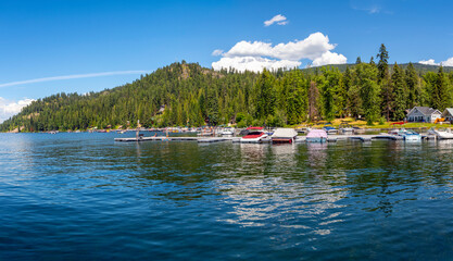 The lakefront resort with sandy beaches, vacation homes and boat slips in their marina at Cavanaugh...