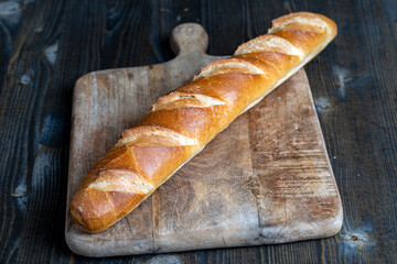 a whole wheat baguette, not cut into pieces