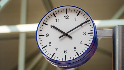 A large clock in the airport