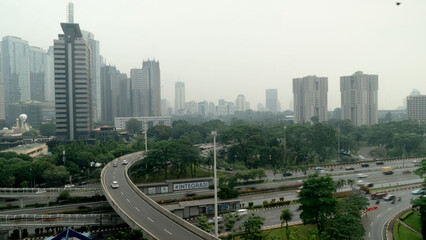 Jakarta, Indonesia on June 24, 2022: Full Shot. Coinciding with the anniversary of DKI Jakarta, Jakarta has officially become the city with the worst air quality and urban pollution in the world!