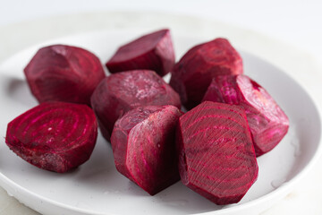beets in a bowl. Cutting beets. 