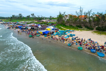 Mui Ne fish market seen from above, the morning market in a coastal fishing village to buy and sell seafood for the central provinces of Vietnam