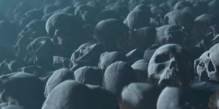 Bunch of Bones Human Skulls covering dusty ground, death conceptual backgound
