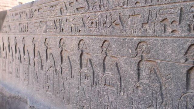 Detail view of ancient writings in the Luxor Temple, Egypt.