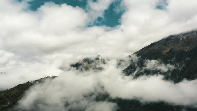 Clouds Around The Summit Of Tungurahua Volcano In The Cordillera Oriental Of Ecuador. Pan Right