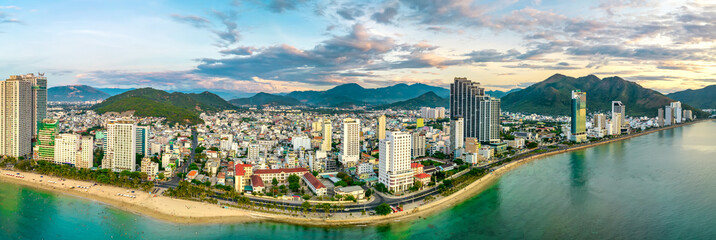 Fototapeta na wymiar The coastal city of Nha Trang seen from above in the morning, beautiful coastline. This is a city that attracts to relax in central Vietnam