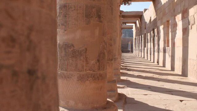 Detail of columns and their shadows on a sunny day in the temple of Philae, Aswan, Egypt.