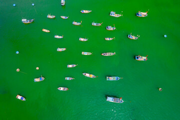 Fishing wharf moored to avoid storms at noon in summer in the beautiful central waters of Vietnam