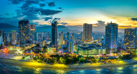 The coastal city of Nha Trang, Vietnam seen from above in the afternoon with its beautiful city and...