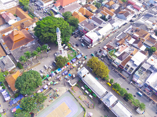 Cicalengka, West Java, Indonesia - 24 July, 2022 : Abstract Defocused Aerial Photo of Cicalengka Square in the morning which is crowded with visitors and there are sports fields and bus stops in the v