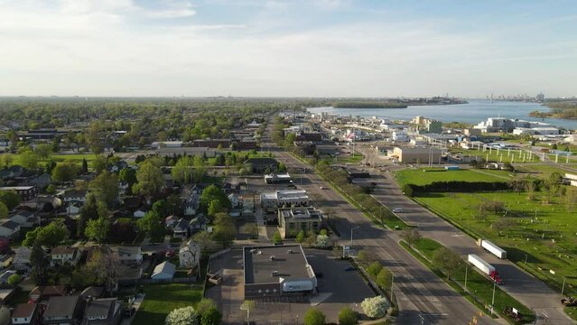 Wyandotte township with skyline of Detroit in horizon, aerial drone view