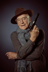 elderly man with gun