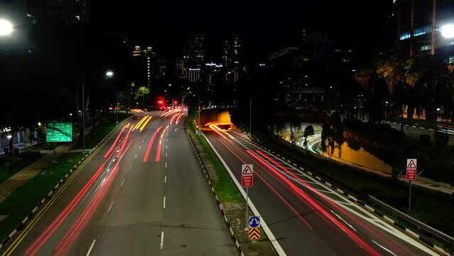 Timelapse of Busy Car Traffic at Night in Singapore City Centre
