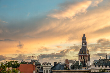 Fototapeta na wymiar Beautiful top view of the rooftops of the Old Town of Riga at sunset