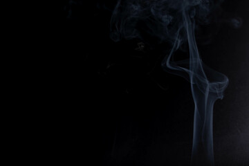 white smoke on a black background