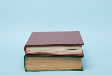 Stack of two books on a blue background