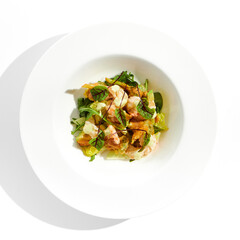 Green salad with broccoli, avocado, shrimps on white plate. Healthy dinner - Salad broccoli and prawns. Clean eating. Green bowl with vegetables and shrimps. Tempura broccoli with avocado