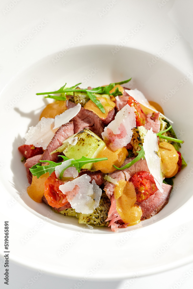 Canvas Prints roast beef and grilled vegetables salad isolated on white background. steak salad with pastrami, egg