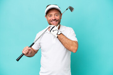 Middle age caucasian golfer player man isolated on blue background happy and smiling