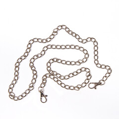 Metal chain with carabiners on a white background.