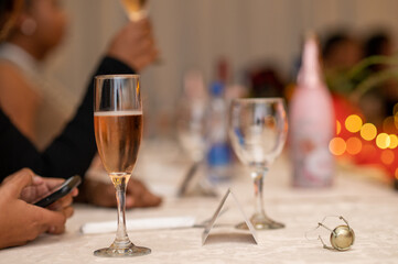 Assorment of glasses seen on table with blurred background