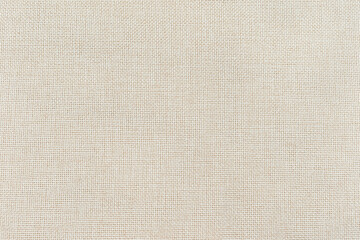 Fototapeta premium macro closeup of a light beige tightly woven linen like fabric showing detailed pattern and texture