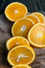ripe orange cut into slices during cooking