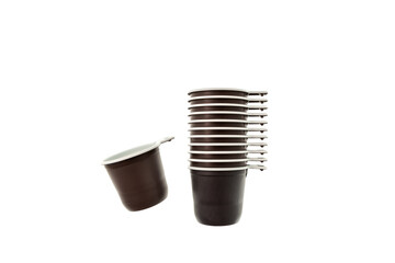 Empty brown disposable plastic cups for coffee or hot tea. Street food and drink, coffee, cacao and tea take away package
