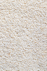 a large number of white dried sesame seeds