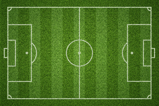 Soccer field or Football field on green grass background