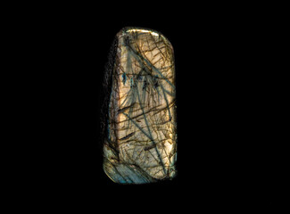 Photo of a colorful blue and brown labradorite stone.