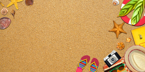 Fototapeta na wymiar Topview Beach Accessories Background on Sand