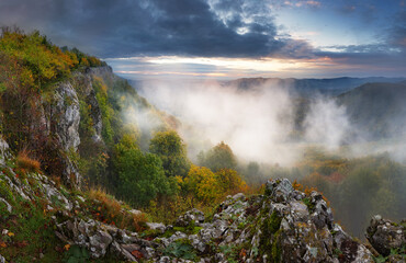 Beautiful autumn morning on the view point above the deep forest valley in Carpathian, Slovakia