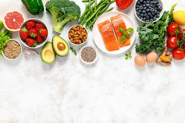 Fototapeta na wymiar Healthy food. Healthy eating background. Salmon, fruit, vegetable and berry. Superfood