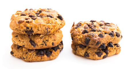 cookies with chocolate and hazelnuts on a white background