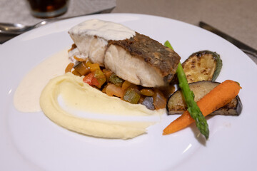 Grilled sea bass fillet eat with tartare and mashed potato