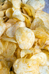 scattered potato chips with natural spices
