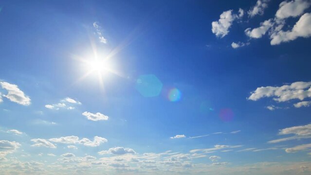 timelapse of beautiful blue sky, sun with clouds on bright sunny day for abstract background
