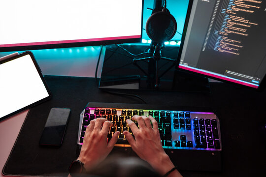 Hand's of man working on desktop PC