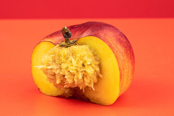 Donut Peaches isolated in red background